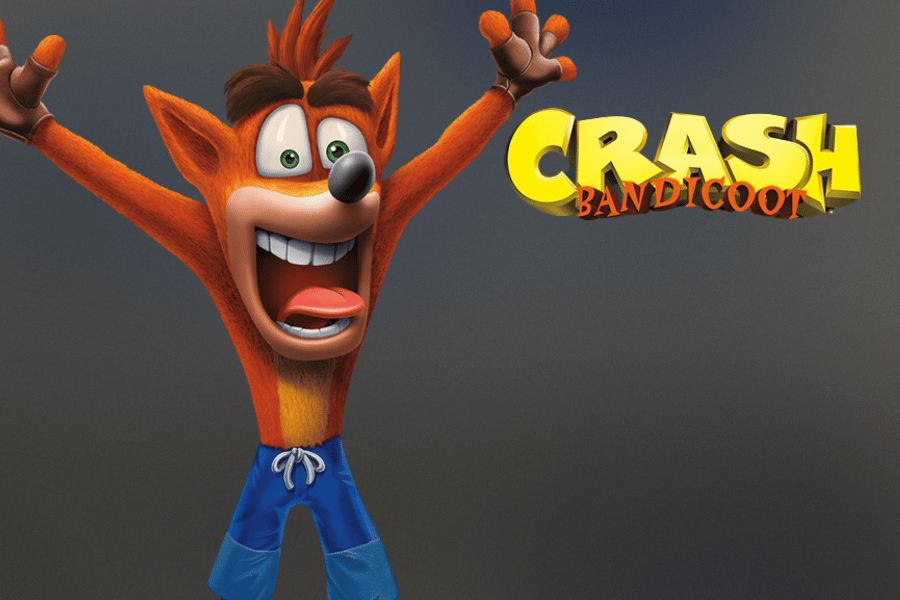 Crash Bandicoot, the energetic and wacky video game character, shown in a joyful pose with arms raised, wearing blue shorts, alongside the bold yellow Crash Bandicoot logo.